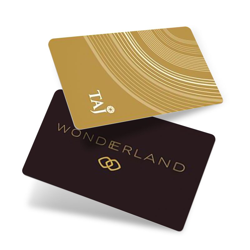 Gold metallic NTAG NFC card with flowing line artwork