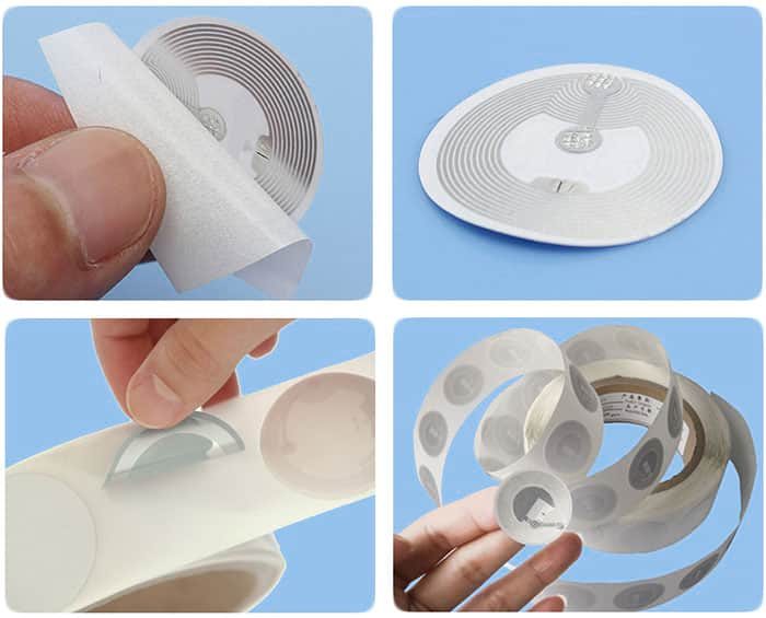 Blank NFC sticker held between fingers